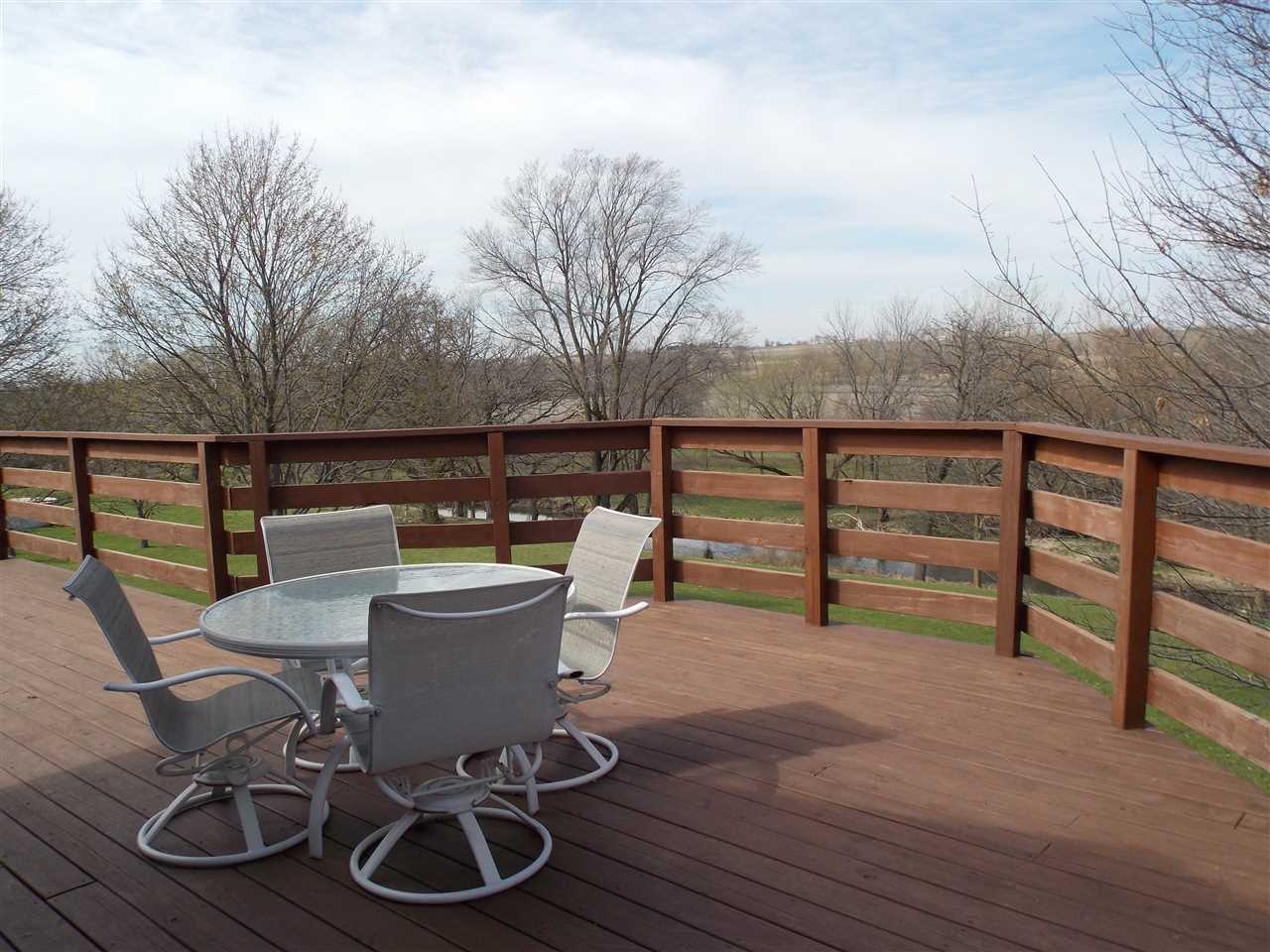 15228 East McNeal Road Monroe Center, IL 61052 - Photo 25 of 25 a view of a chairs and table on the wooden floor