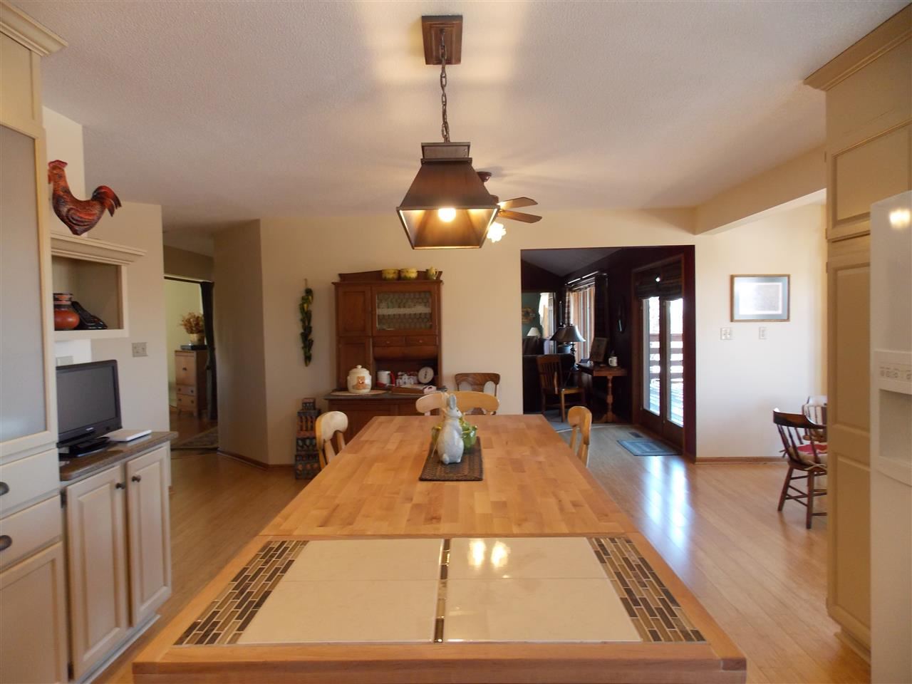 15228 East McNeal Road Monroe Center, IL 61052 - Photo 6 of 25 a room with pool table and a flat screen tv