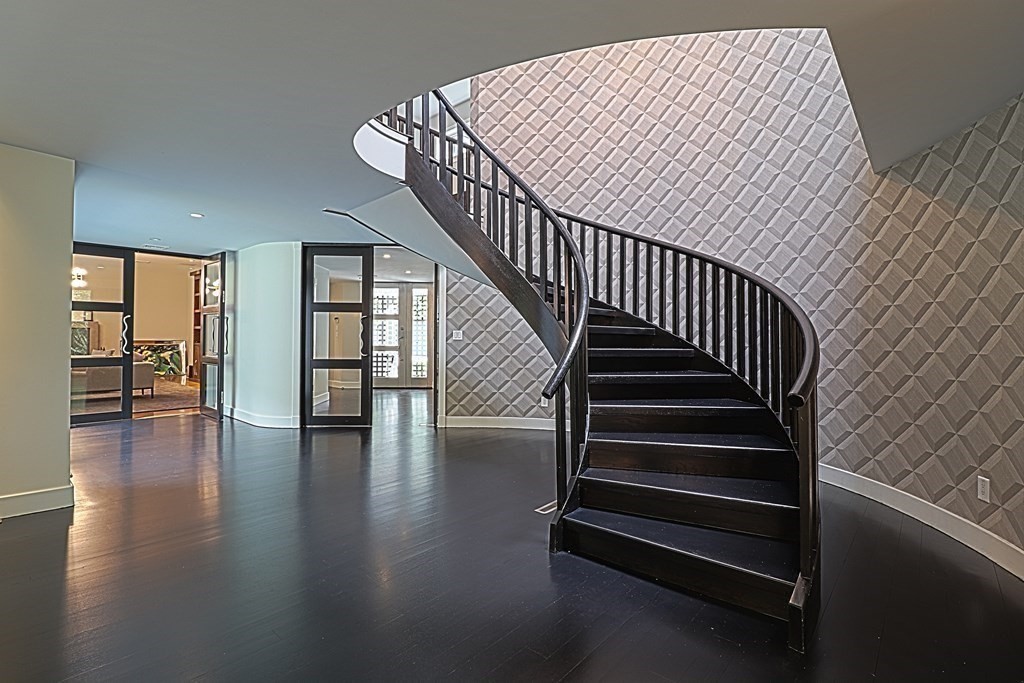 6 Sutton Place Acton, MA 01720 - Photo 13 of 24 a view of entryway and hall with wooden floor