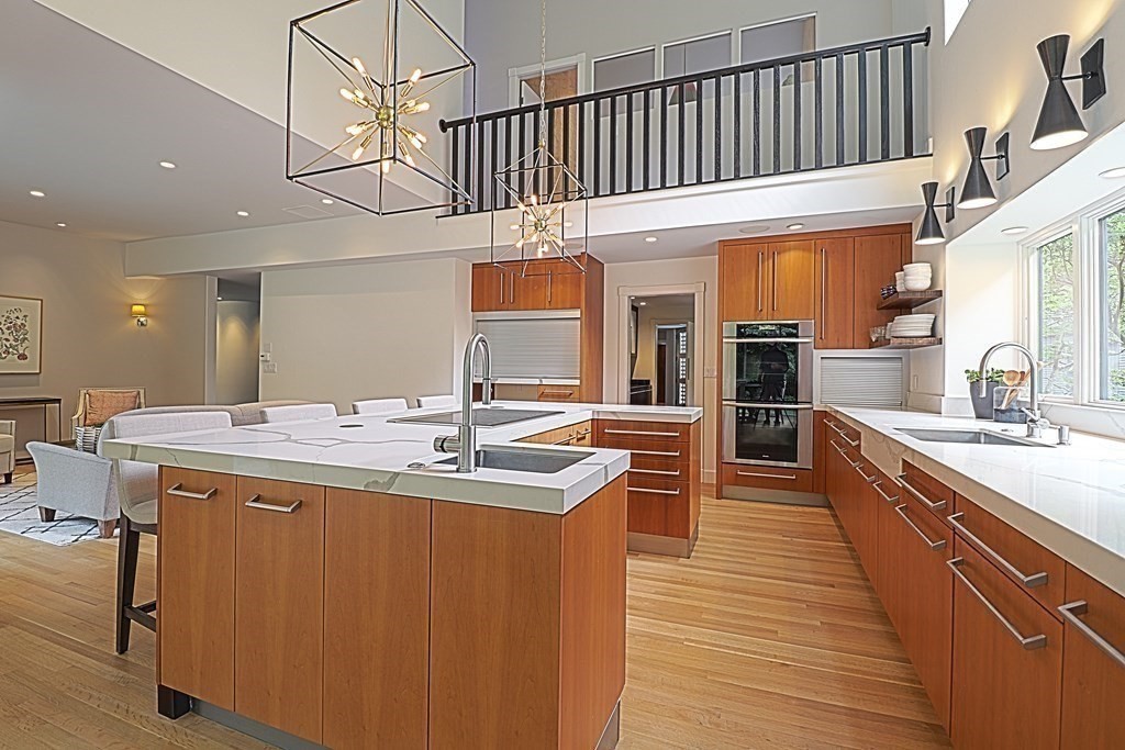 6 Sutton Place Acton, MA 01720 - Photo 2 of 24 a kitchen with stainless steel appliances granite countertop a sink a stove and a wooden floors