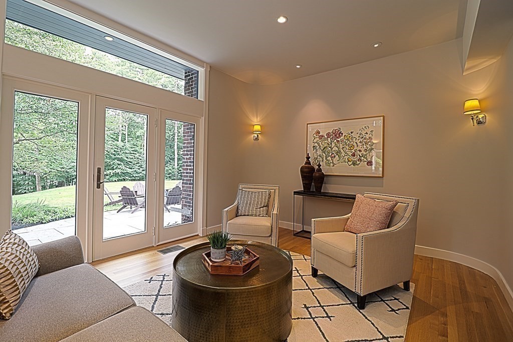 6 Sutton Place Acton, MA 01720 - Photo 5 of 24 a living room with furniture and a large window
