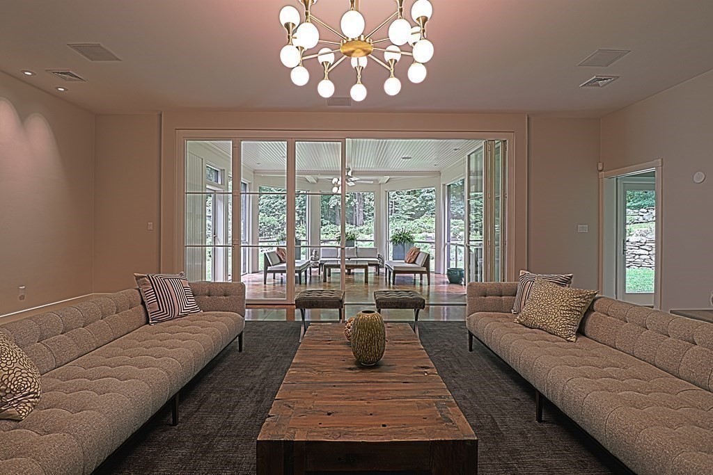 6 Sutton Place Acton, MA 01720 - Photo 7 of 24 a living room with furniture and a large window