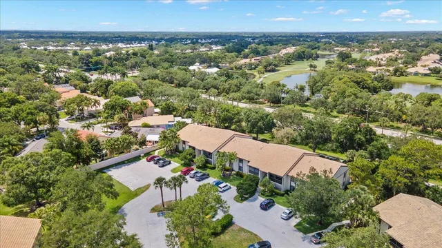an aerial view of a house with a garden
