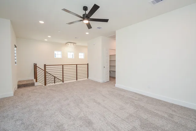 a view of a hallway with closet