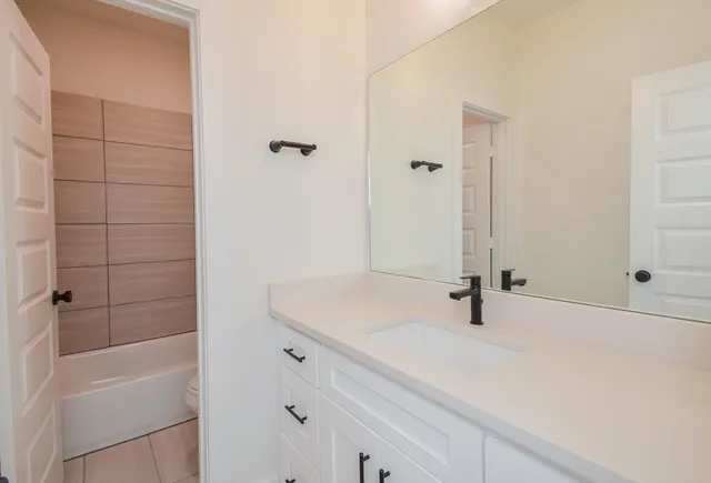 a bathroom with a bathtub