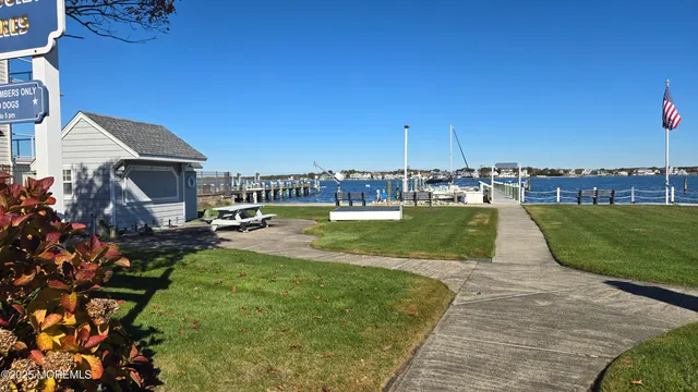 a view of a house with a yard porch and sitting area