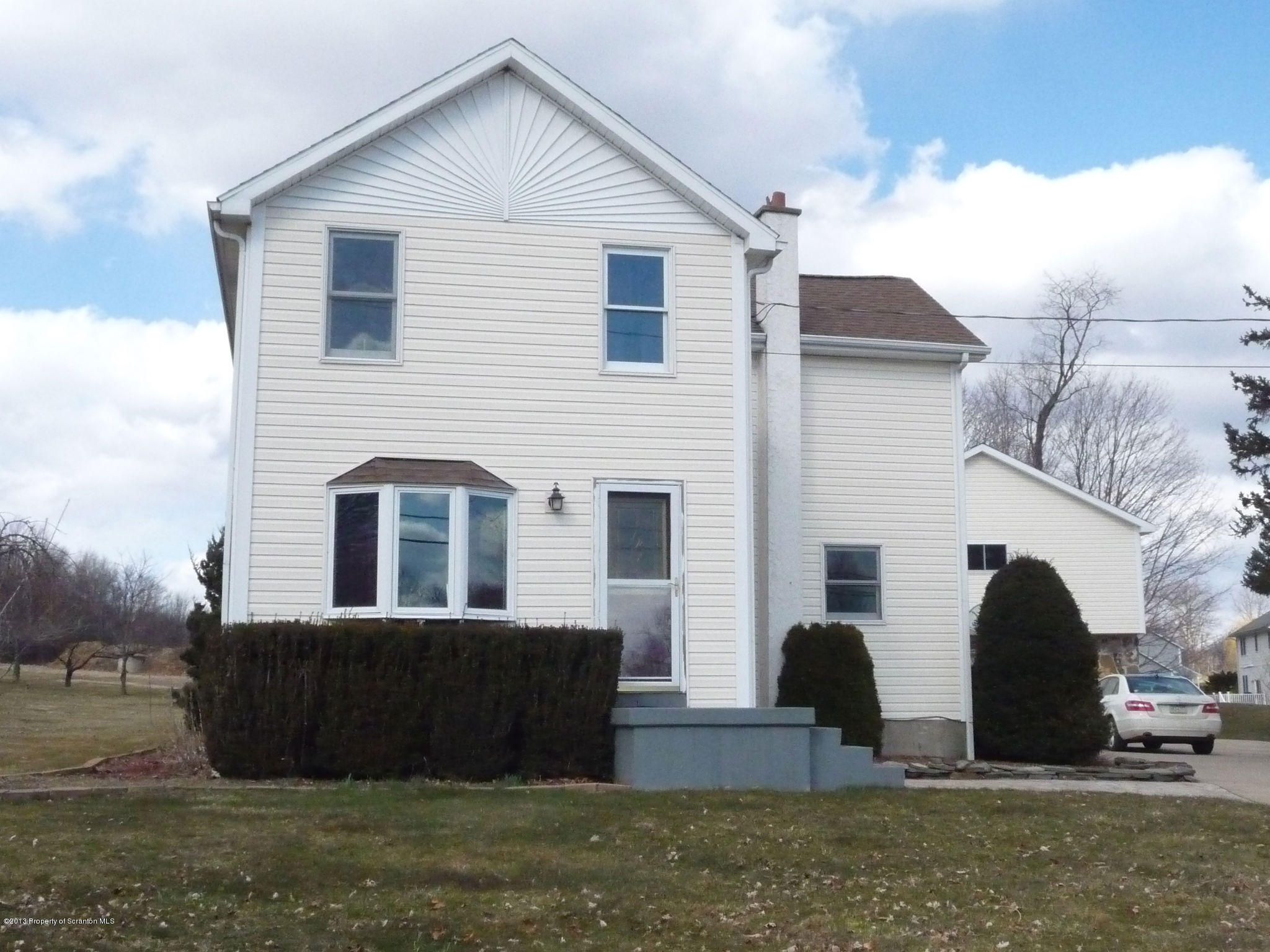 817 Coon Road Wyoming, PA 18644 - Photo 1 of 20 a view of house with yard