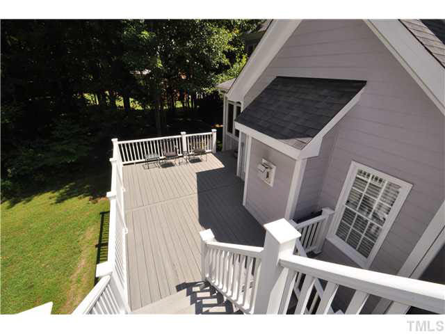 4209 White Chapel Way Raleigh, NC 27615 - Photo 21 of 25 The main house deck is reminiscent of large beach houses on the coast! Enjoy cool summer evenings with friends while watching the fireflies! Patio/Deck