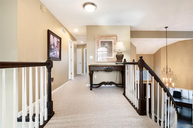 a kitchen with stainless steel appliances a stove and a refrigerator
