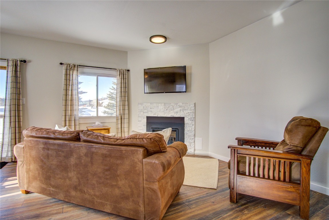 78 Summit Drive, Unit C11 Dillon, CO 80435 - Photo 12 of 21 a living room with furniture and a flat screen tv