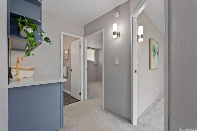 a bathroom with a double vanity sink and shower