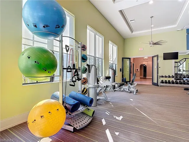 a view of a room with a table and chairs