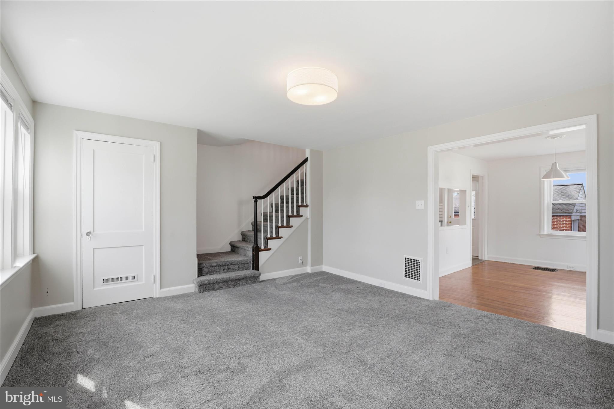 1630 Lampeter Road Lancaster, PA 17602 - Photo 14 of 49 a view of an empty room with wooden floor and a window