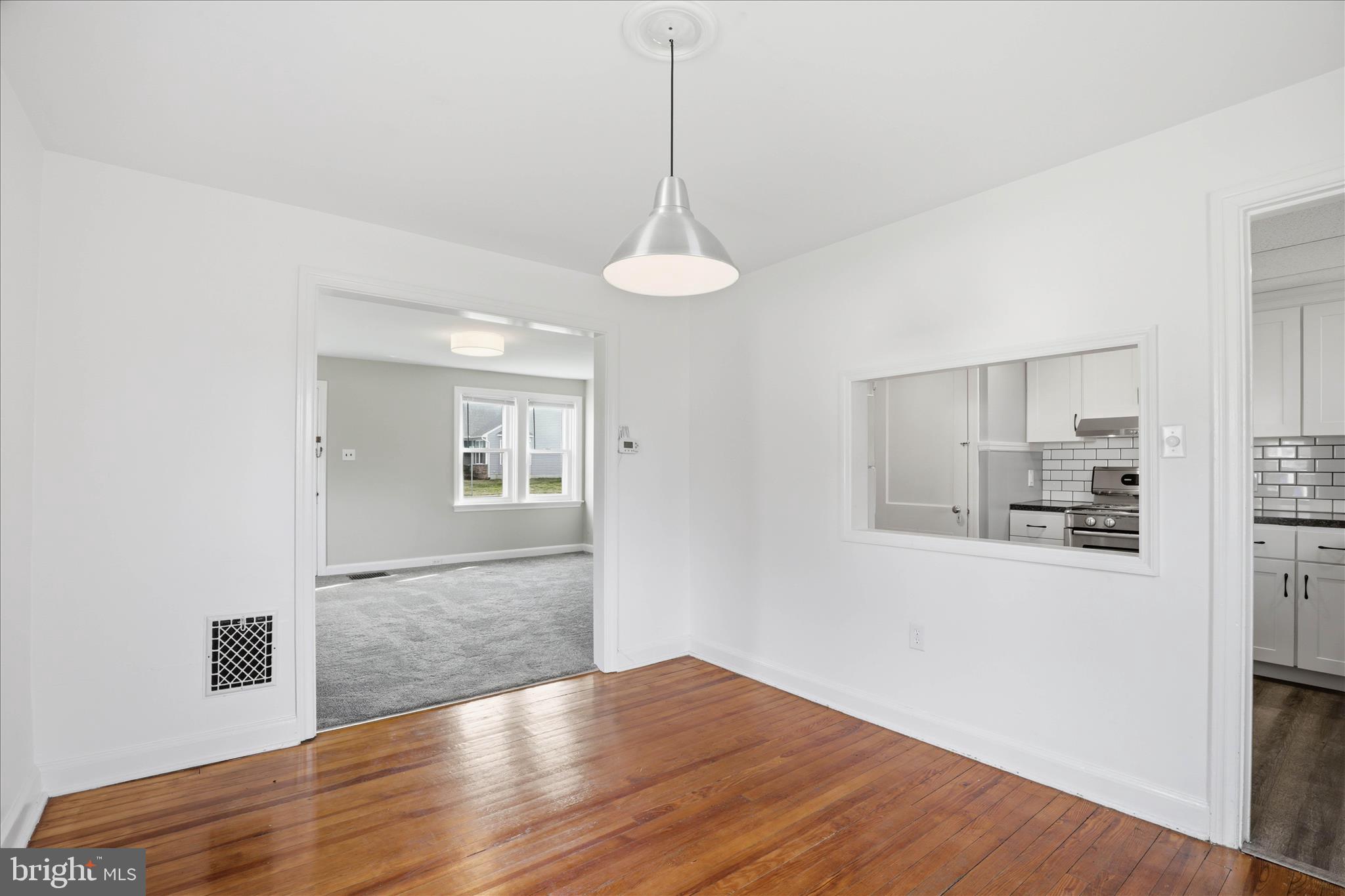 1630 Lampeter Road Lancaster, PA 17602 - Photo 16 of 49 a view of a room with wooden floor and white cabinet