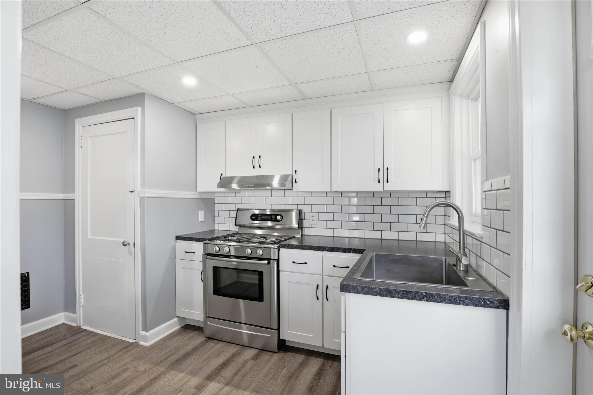 1630 Lampeter Road Lancaster, PA 17602 - Photo 18 of 49 a kitchen with a stove sink and cabinets