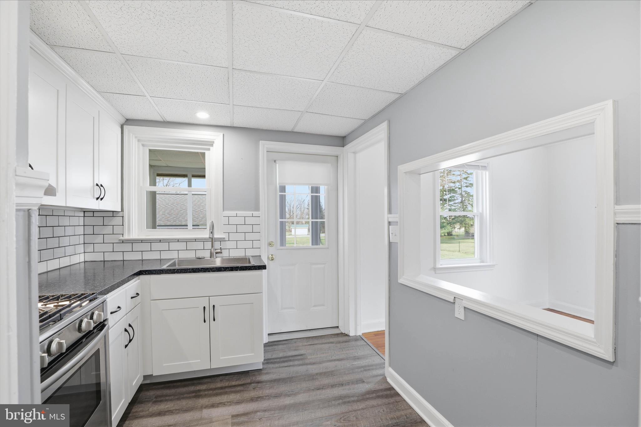 1630 Lampeter Road Lancaster, PA 17602 - Photo 19 of 49 a kitchen with a sink stove and cabinets