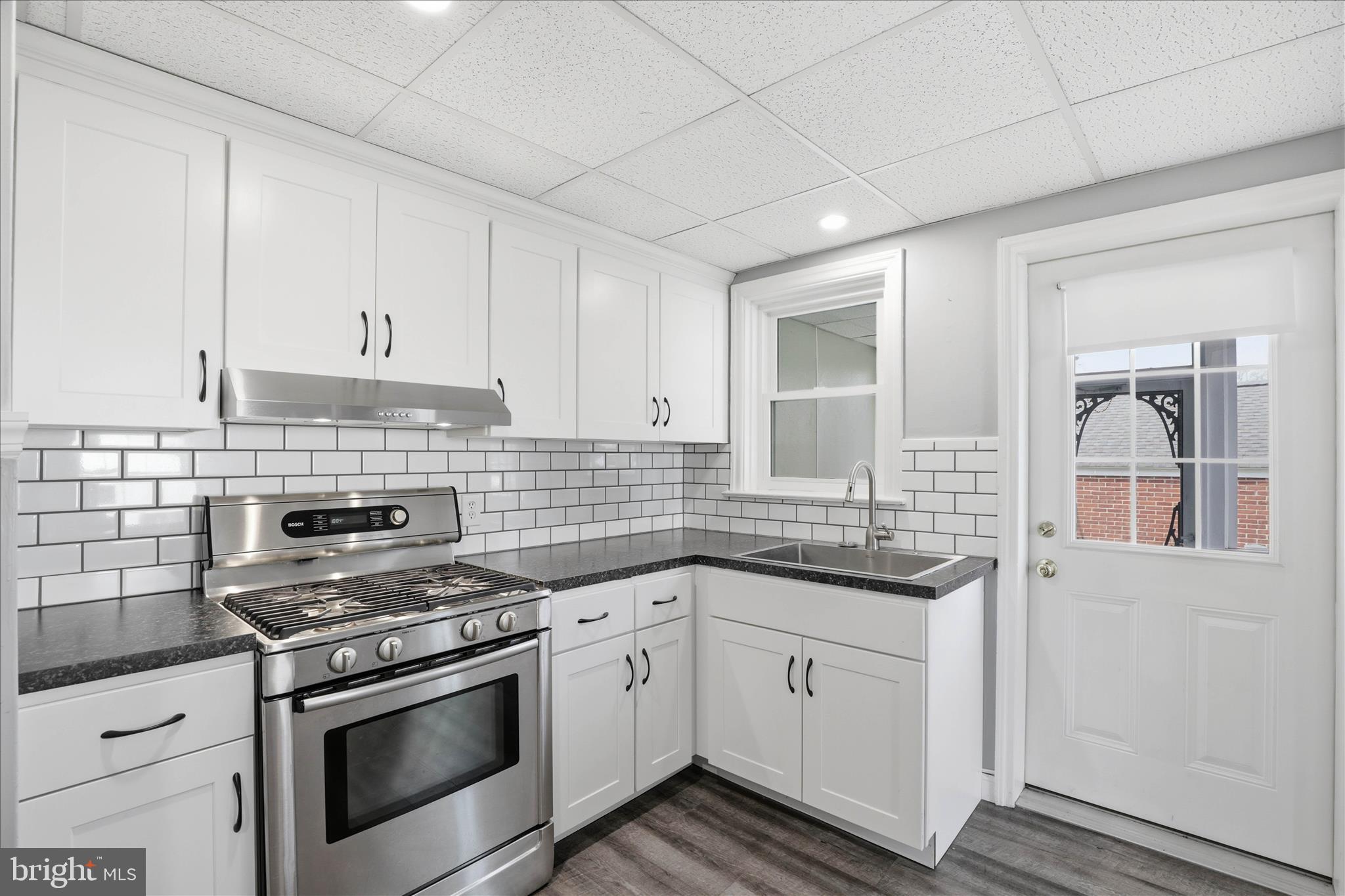 1630 Lampeter Road Lancaster, PA 17602 - Photo 20 of 49 a kitchen with white cabinets stainless steel appliances and sink
