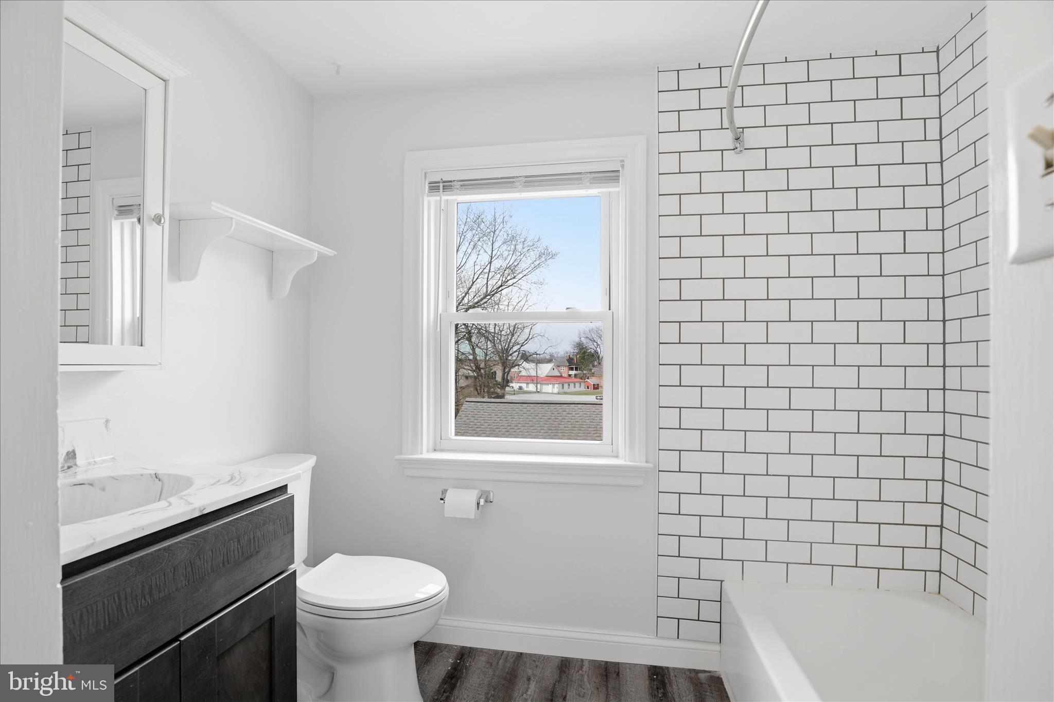 1630 Lampeter Road Lancaster, PA 17602 - Photo 27 of 49 a bathroom with a toilet a sink and bath tub