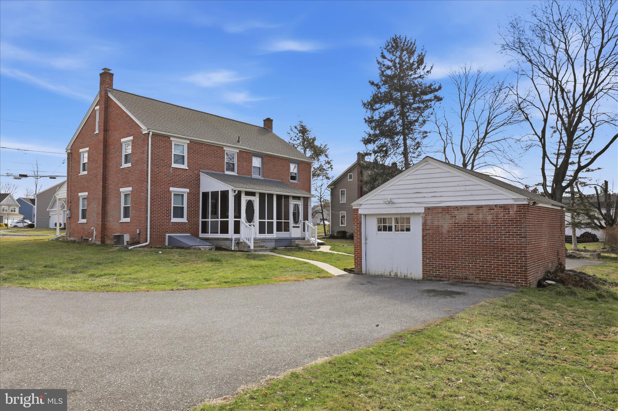 1630 Lampeter Road Lancaster, PA 17602 - Photo 36 of 49 a front view of a house with a yard and garage