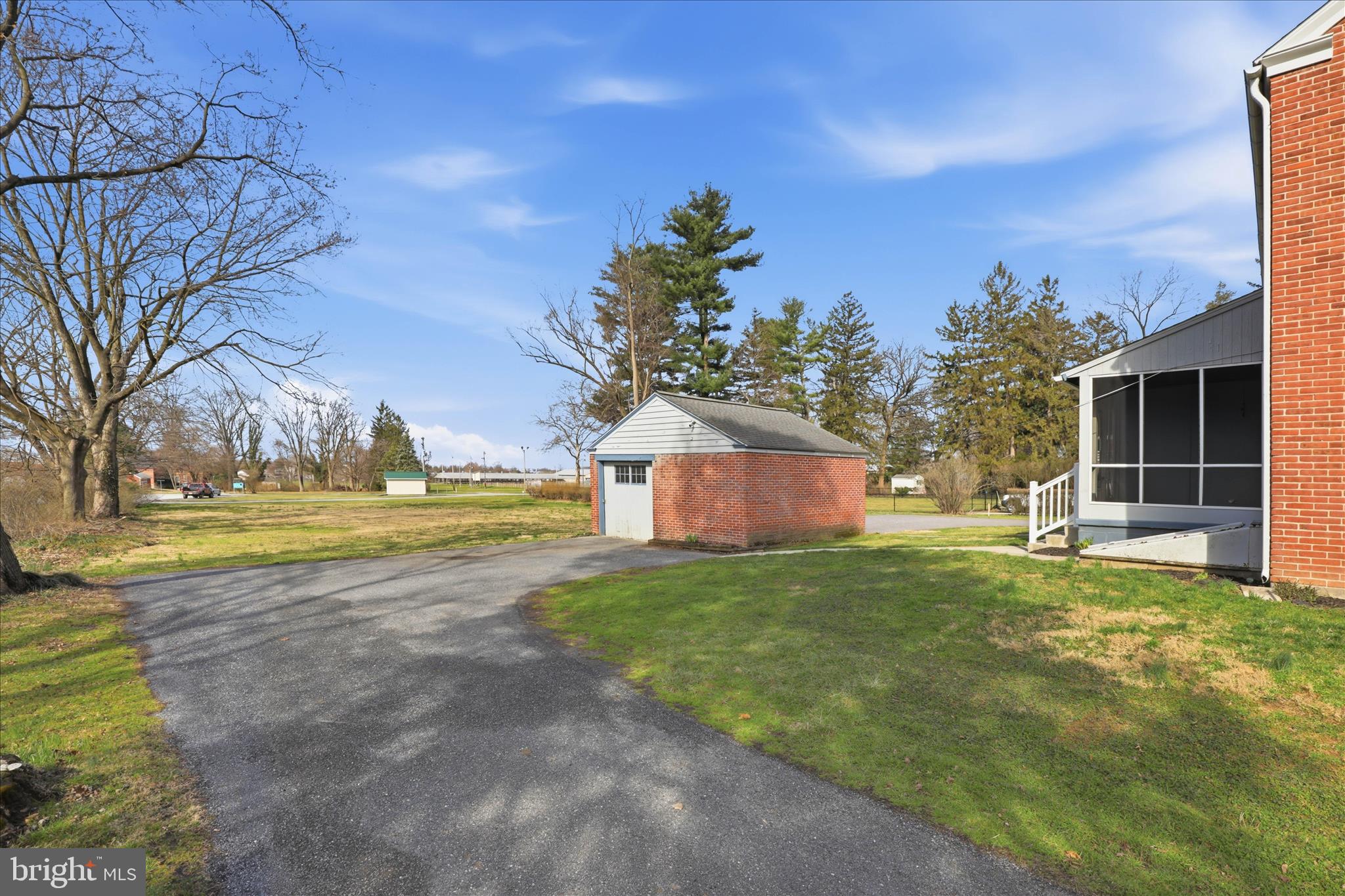 1630 Lampeter Road Lancaster, PA 17602 - Photo 38 of 49 a view of a house with a big yard and large trees