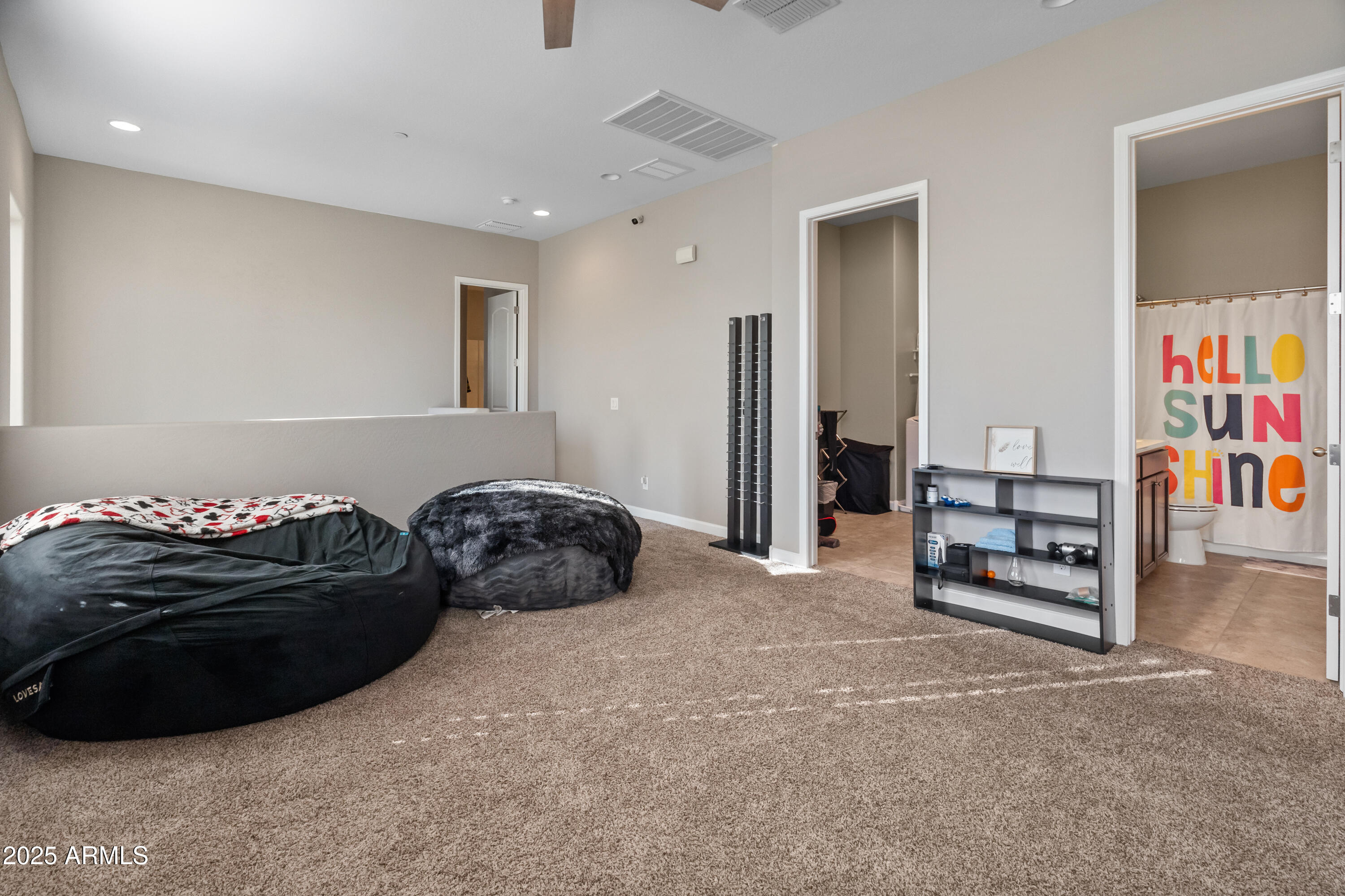 3020 North 37th Street Phoenix, AZ 85018 - Photo 10 of 23 a bedroom with a bed and a couch