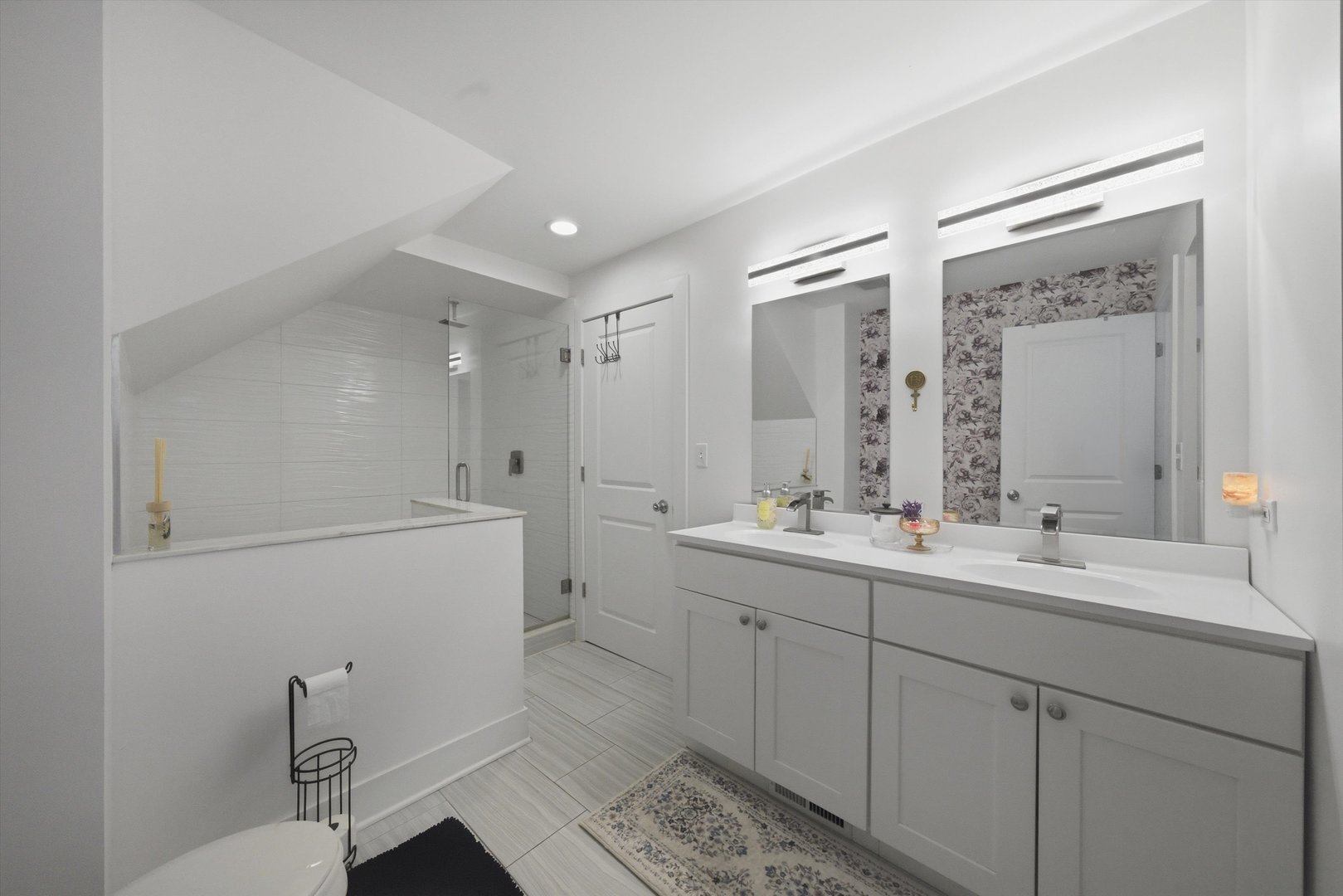 4636 Custer Avenue Brookfield, IL 60513 - Photo 11 of 23 a bathroom with a double vanity sink mirror and toilet