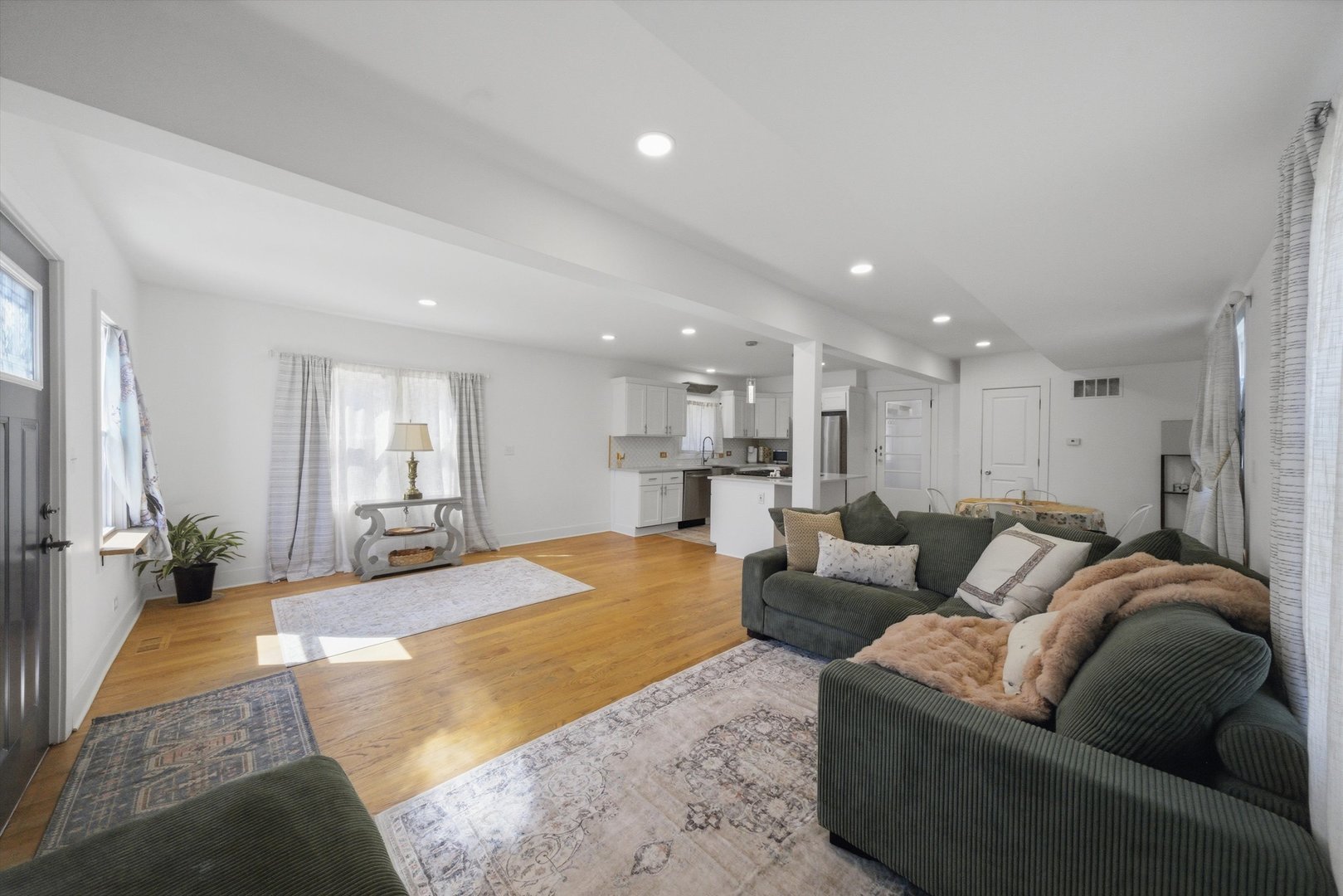4636 Custer Avenue Brookfield, IL 60513 - Photo 5 of 23 a living room with furniture and a large window