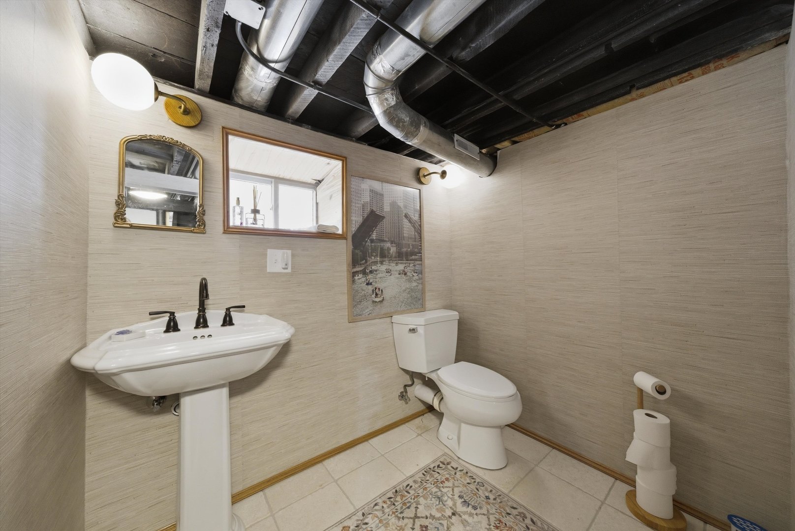 4636 Custer Avenue Brookfield, IL 60513 - Photo 8 of 23 a bathroom with a sink toilet and a mirror