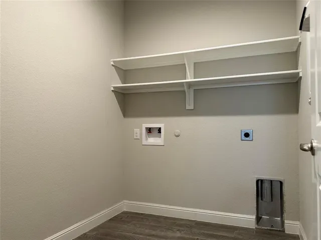 a view of small space with racks on the wall