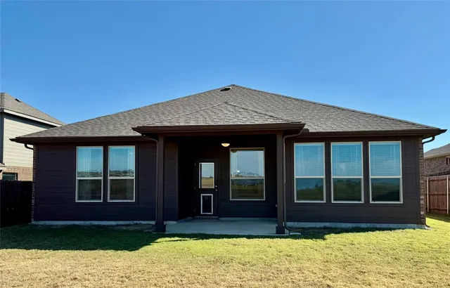 a house view with a garden space