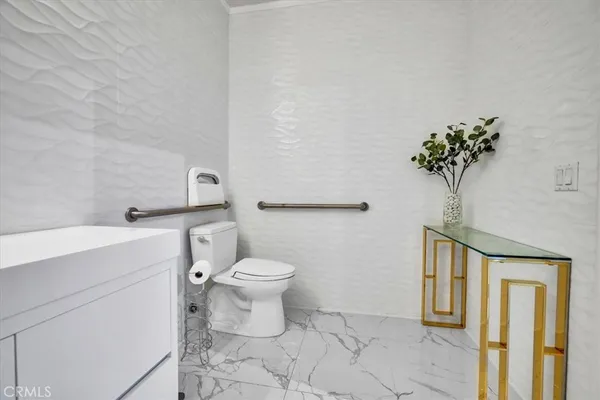 a view of livingroom with furniture and a flat screen tv