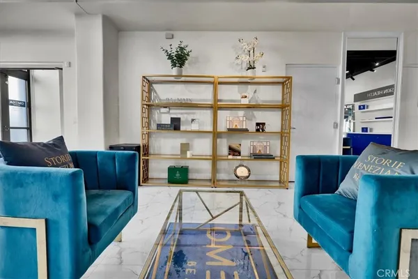 a kitchen with granite countertop a sink and a stove