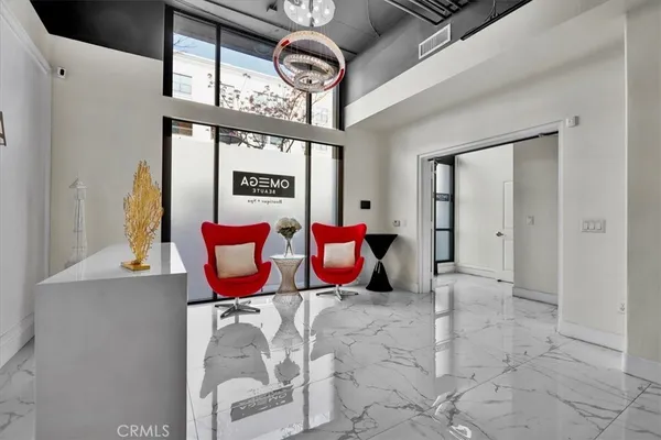 a kitchen with stainless steel appliances granite countertop a stove and a refrigerator