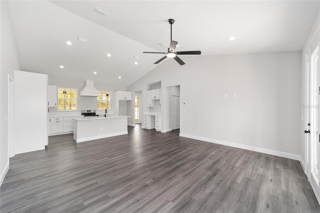 1370 Northeast 151 Avenue Williston, FL 32696 - Photo 12 of 51 a view of kitchen with cabinets and wooden floor