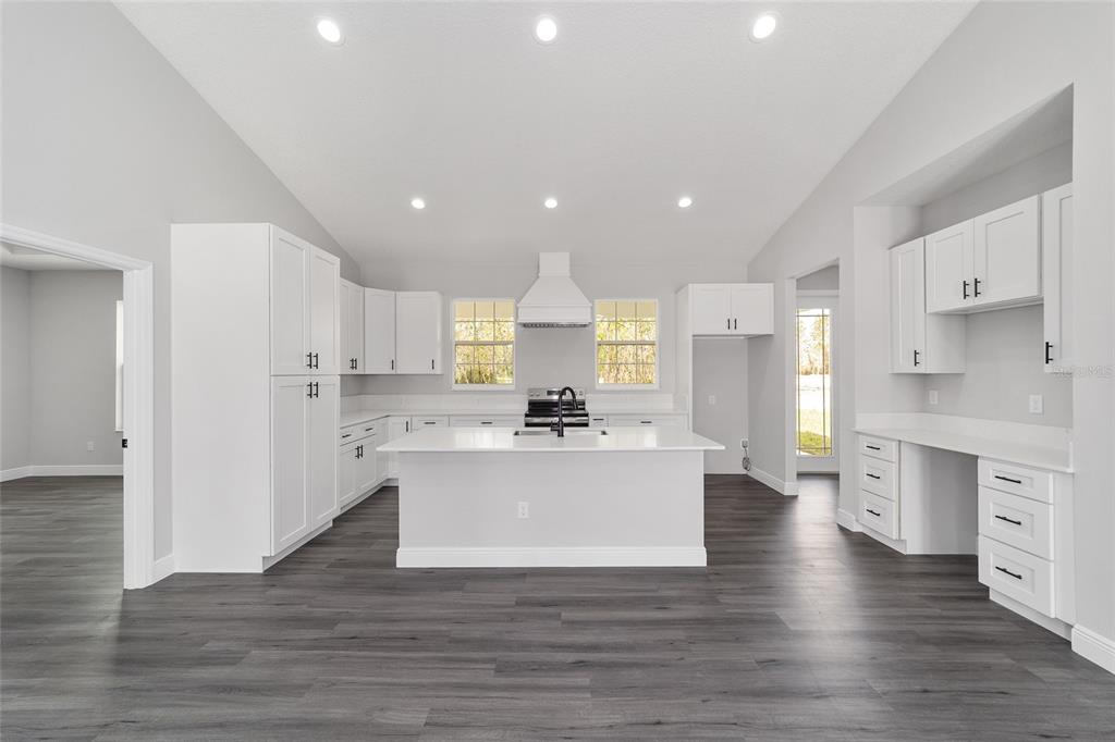 1370 Northeast 151 Avenue Williston, FL 32696 - Photo 15 of 51 a view of kitchen with stainless steel appliances refrigerator stove microwave and cabinets