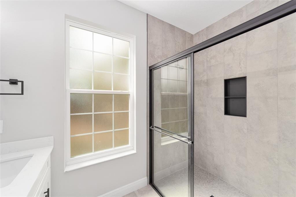 1370 Northeast 151 Avenue Williston, FL 32696 - Photo 25 of 51 a bathroom with a tub and shower