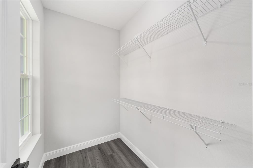 1370 Northeast 151 Avenue Williston, FL 32696 - Photo 29 of 51 a view of a room with wooden floor