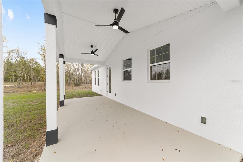 1370 Northeast 151 Avenue Williston, FL 32696 - Photo 36 of 51 a view of a house with a big yard