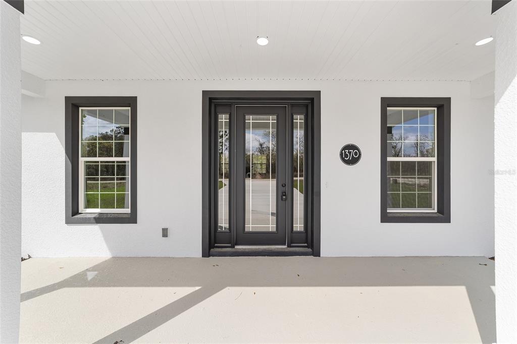 1370 Northeast 151 Avenue Williston, FL 32696 - Photo 9 of 51 a black and white photo of a living room