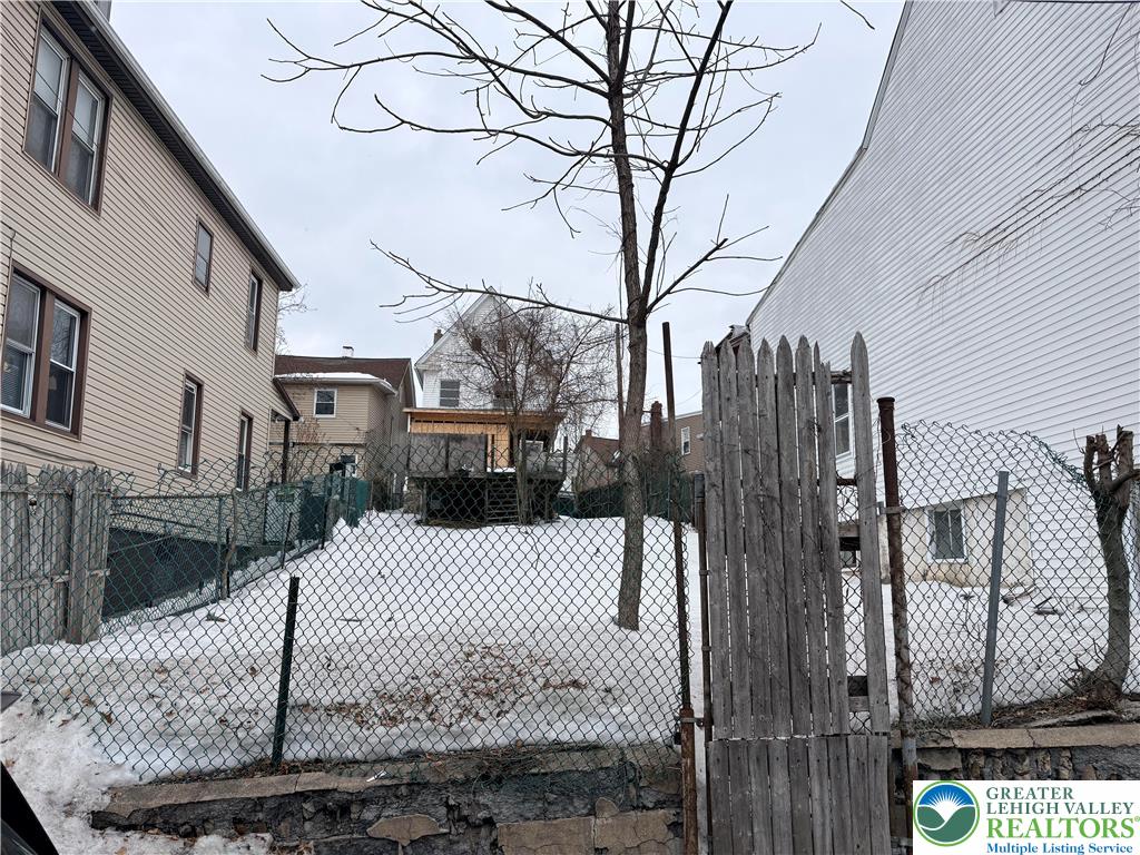 310 West Ridge Street Lansford, PA 18232 - Photo 13 of 13 a view of a white house with a large tree