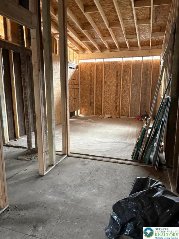 310 West Ridge Street Lansford, PA 18232 - Photo 10 of 13 a view of an empty room with wooden walls