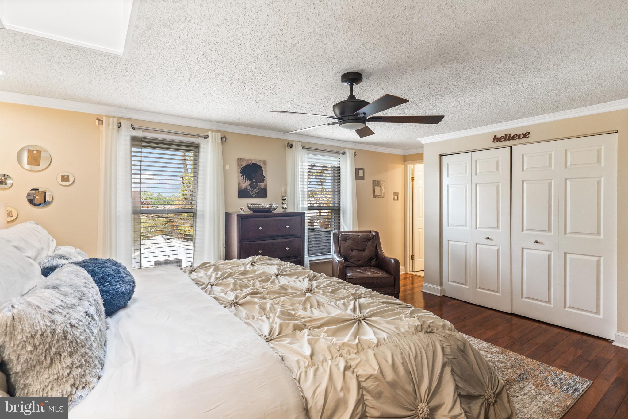 7616 Blue Grass Road Rosedale, MD 21237 - Photo 23 of 50 a bedroom with a large bed and a window