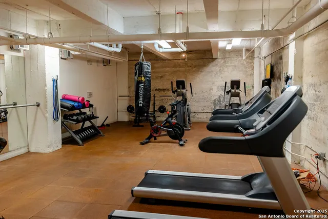 a view of a room with gym equipment
