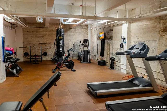 a view of a room with gym equipment