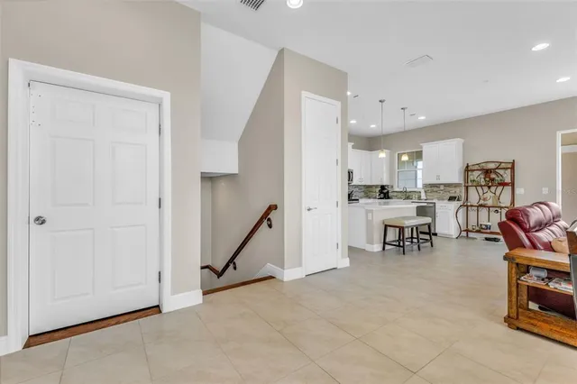 a view of a city from a dining room with furniture window and outside view