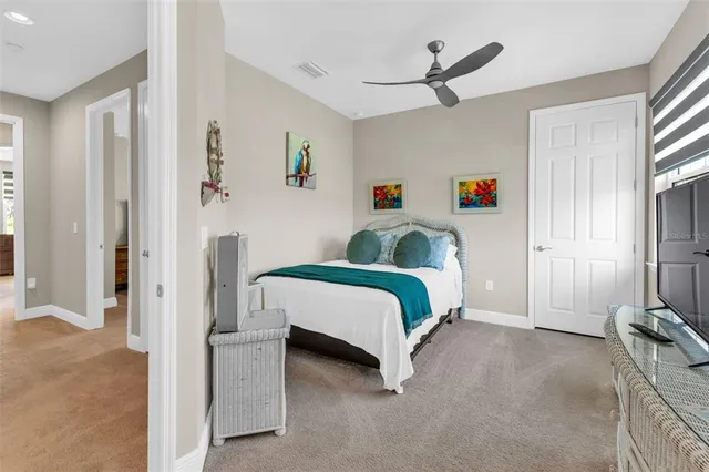 a view of a swimming pool with a patio and a yard