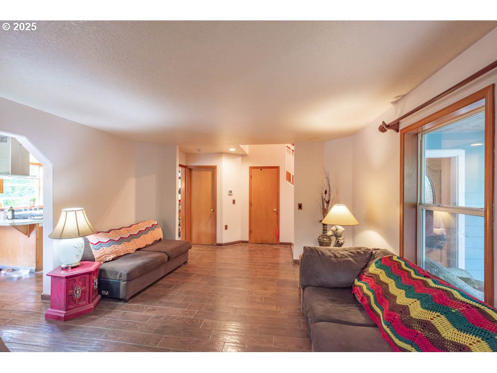 609 Van Buren Street Oregon City, OR 97045 - Photo 17 of 34 a living room with furniture and a couch