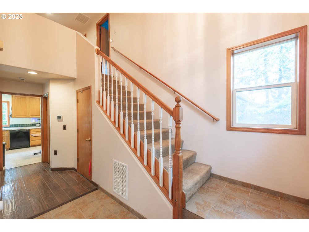 609 Van Buren Street Oregon City, OR 97045 - Photo 19 of 34 a view of entryway and hall with wooden floor