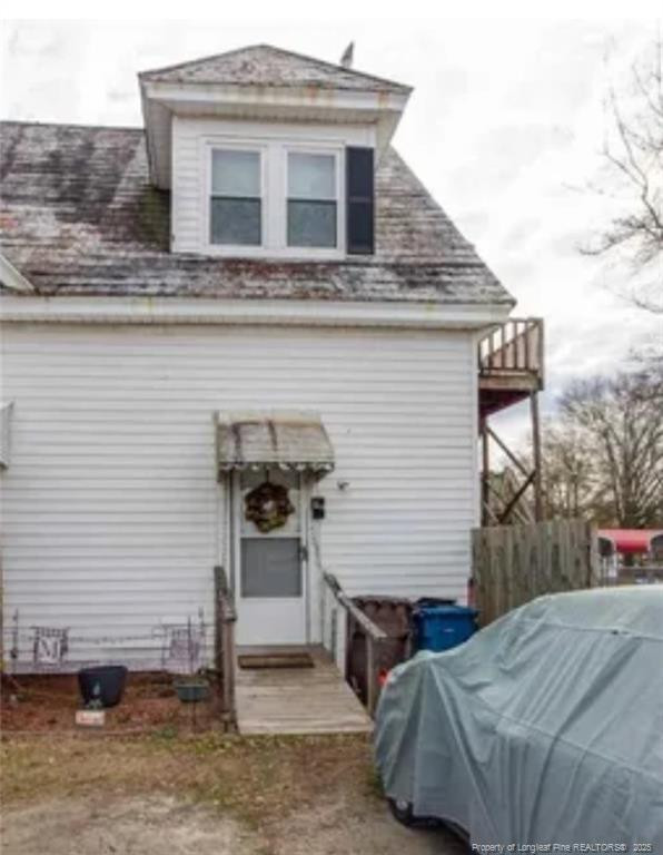 a front view of a house with garage