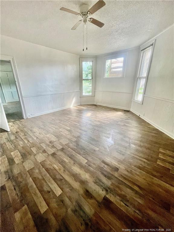 401 South Clinton Avenue, Unit B Dunn, NC 28334 - Photo 7 of 8 an empty room with windows